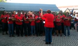 The Combined Choirs of Southgate and Calvary Baptist Church sing on the boardwalk during the afternoon.